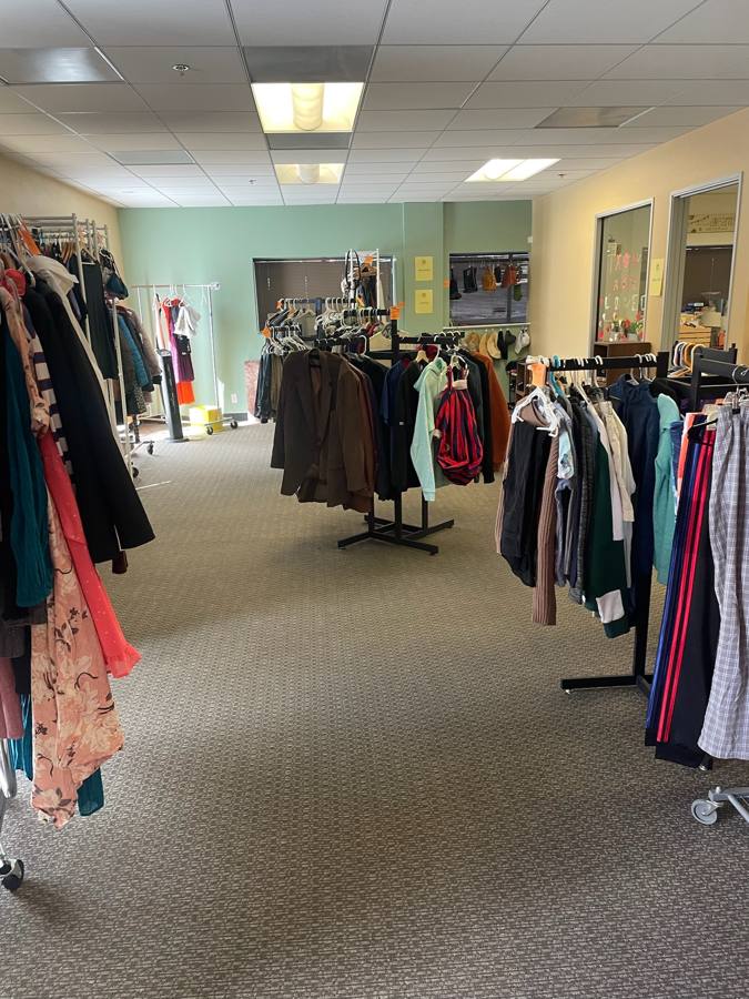 Clothing racks organized by size at the Lamorinda Care Collective